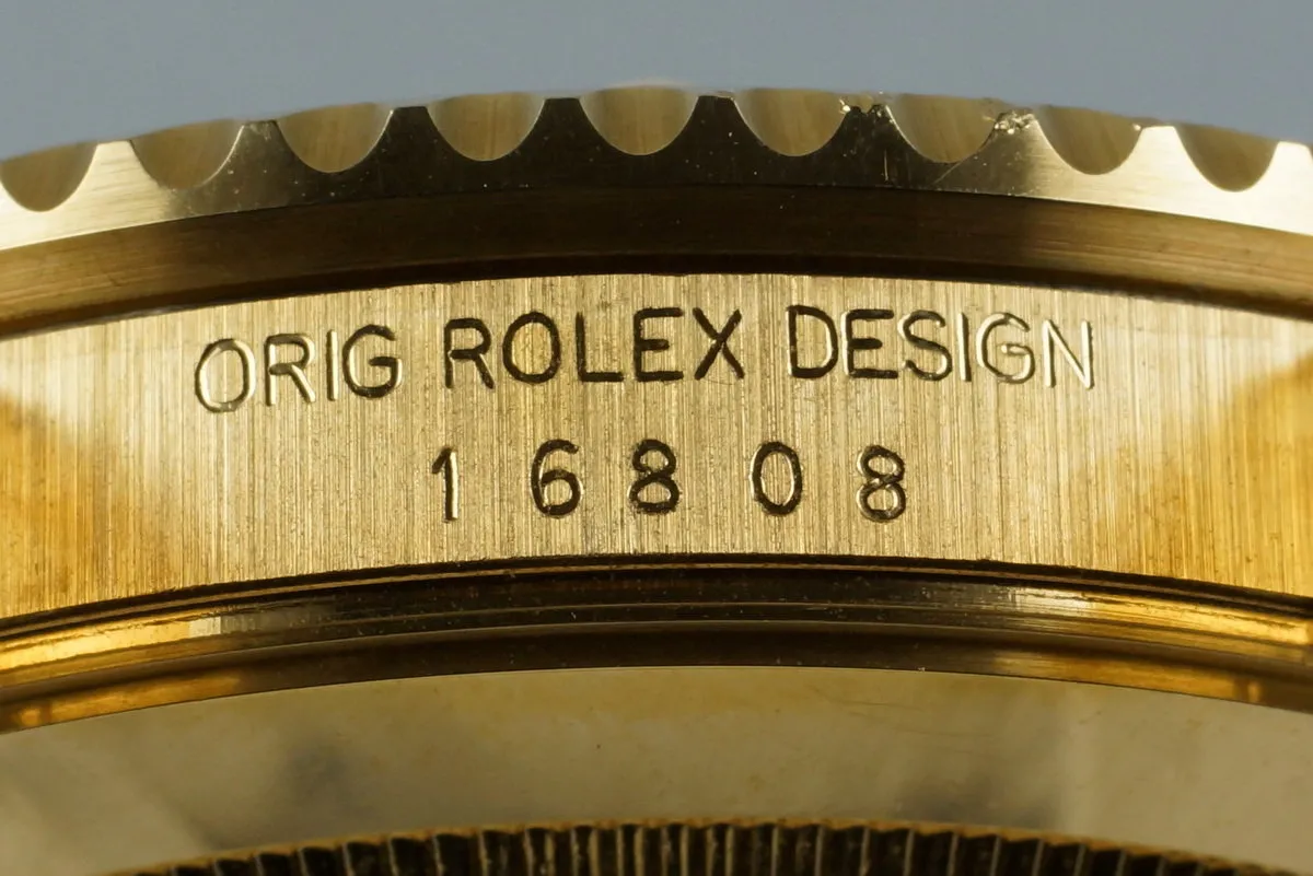 1985 Rolex YG Blue Submariner 16808 with Box and Papers