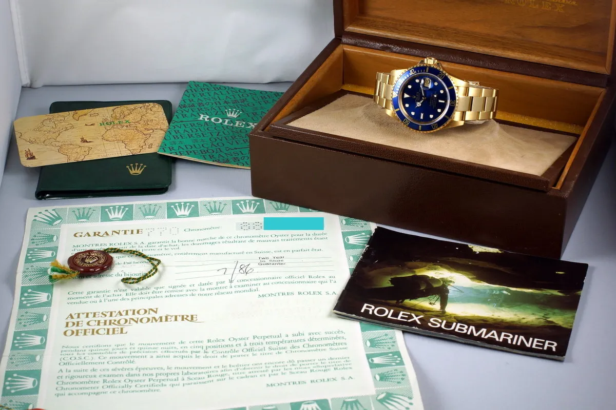 1985 Rolex YG Blue Submariner 16808 with Box and Papers