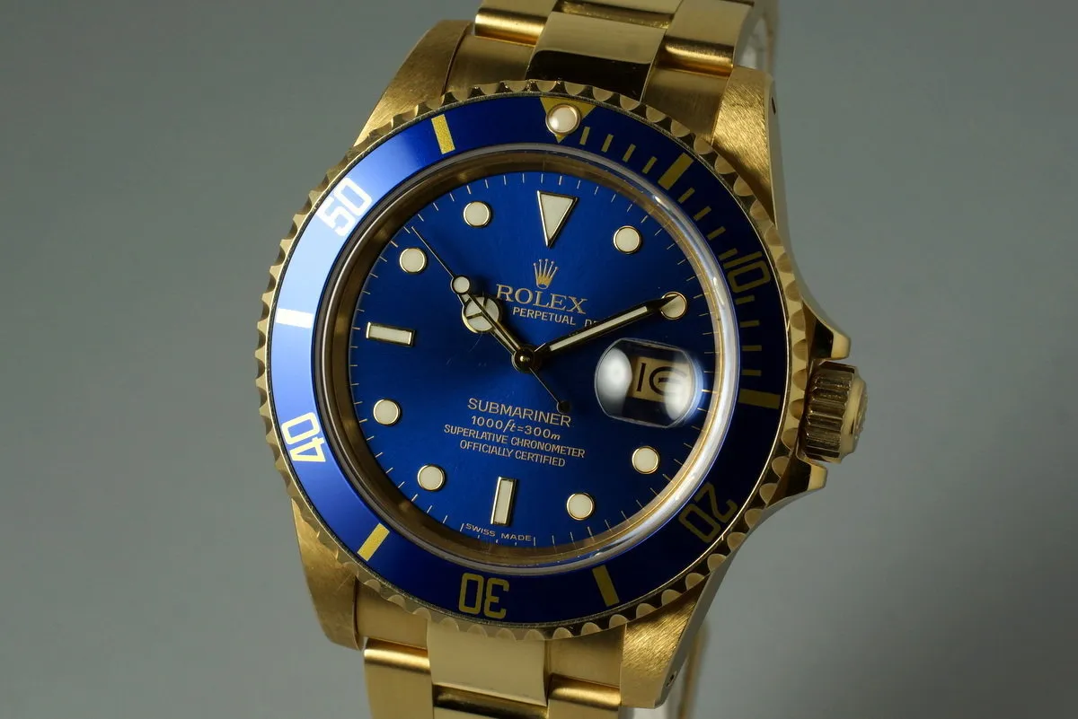 1985 Rolex YG Blue Submariner 16808 with Box and Papers