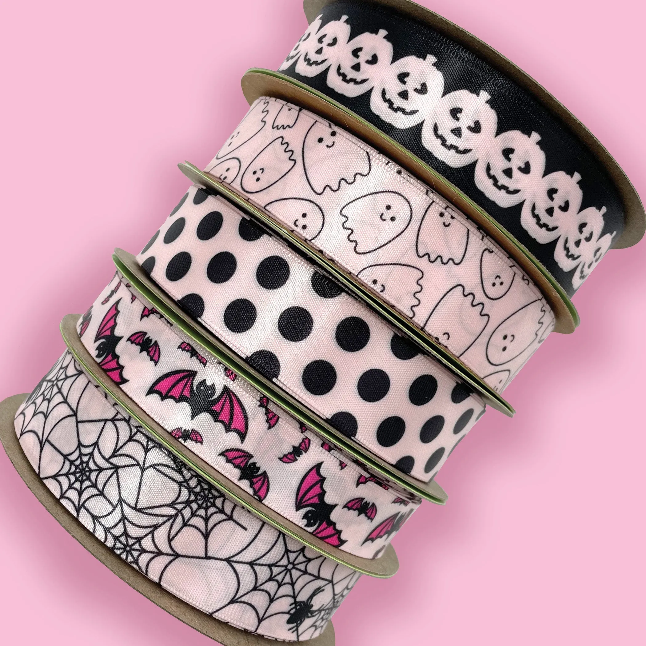 Black  dots ribbon printed on 7/8" light pink single face satin